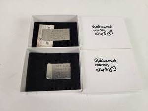 lot 750 image: (2) Retirement Money Clips