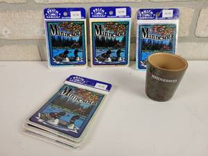 lot 768 image: (8) Minnesota Prism Stickers (3 x 3.5) and Minnesota Shot Glass