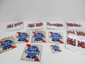 lot 86 image: Vintage 1970s-80s Beer Advertising Jacket Patches & Inflatables