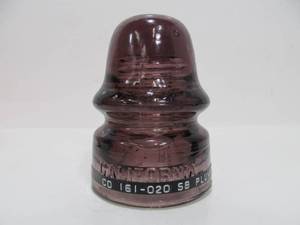 lot 15 image: Antique California CD 161-020 Plum Color Glass Insulator