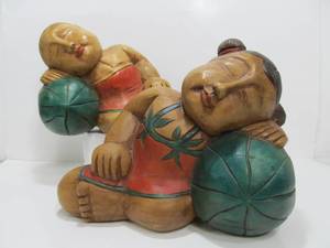 lot 21 image: Pair of Large Carved Wood Chinese Good Luck Sleeping Figures