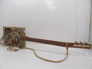 lot 101 image: Quality Signed Working Cigar Box Electric Guitar