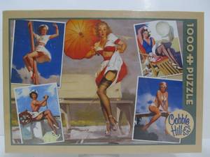 lot 107 image: New in Box Cobble Hill PINUP Girl Puzzle - 1000 Pieces