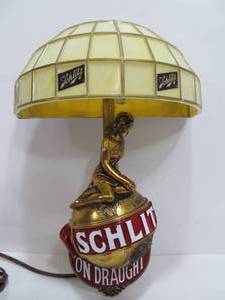 lot 131 image: Nice Vintage SCHLITZ Beer Advertising Lighted Wall Maiden on Globe Sign