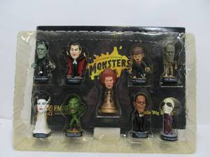 lot 186 image: FAO Schwartz Toy Store Exclusive MONSTERS Little Big Heads Toy Set