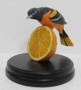 lot 242 image: Hand Painted Loon Lake Oriole on Orange Bird Sculpture