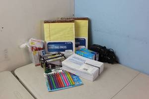 Office Supplies including many pens and electric stapler
