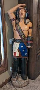 lot 1 image: Life Size Cigar Store Statue - Chief Poke in the Nose Life Size Cigar Store Statue