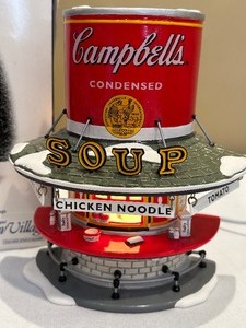 lot 50 image: Department 56 Snow Village Campbell Soup Counter Top and Mm Mm Good Figurine