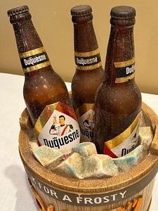 lot 68 image: Vintage Duquesne Beer Duke Bucket of Three Bottles in Vintage Faux Ice