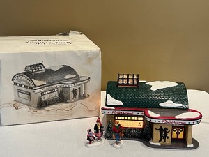 lot 55 image: Department 56 Snow Village Rollerama and Figurines