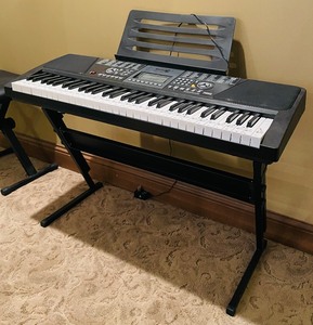 lot 134 image: Rock Jam Multi-Functional Keyboard, Headphones and Stool