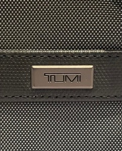 lot 157 image: Small Tumi Toiletries Bag