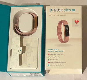 lot 209 image: 2 Fitbit Alta HR