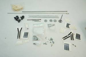 lot 211 image: Toy tractor parts