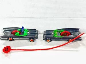 lot 58 image: 1973 Ahi Lot of 2 Batmobile Zip Cord Toys