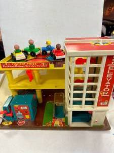 lot 98 image: 1970 Fisher Price Play Family Action Garage #930