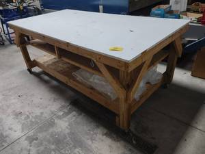 lot 84 image: Rolling Make-UpShipping Table, 8x...