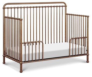lot 26 image: Namesake Winston 4-in-1 Convertible metal Crib in Vintage Gold