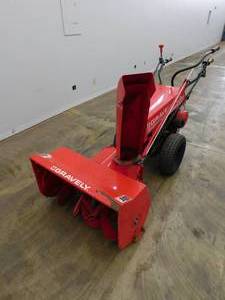 lot 4 image: Gravely 12 Professional Snow Blower with Broom & Mower Attachments