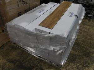 lot 28 image: Trucor Sundance Teak Luxury Vinyl Plank Flooring - 1112 Sq. Ft.