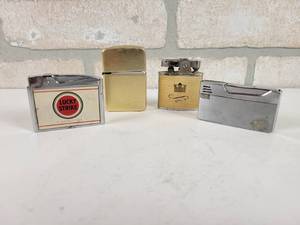 lot 409 image: (4) Vintage Lighters - (2) Continental, Storm King and Milo