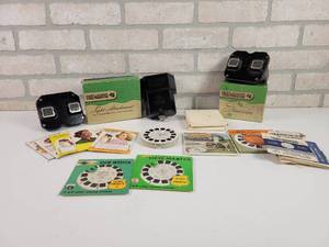 lot 429 image: Vintage View Master Collection - (2) Viewers, Light Attachment and Many Slides, some new in Package