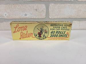 lot 448 image: Vintage Lone Rider Repeating Roll Paper Caps - Box is Full