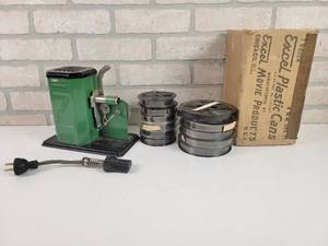 lot 392 image: Vintage EXCEL 16mm Film Projector w (11) Films - WORKS