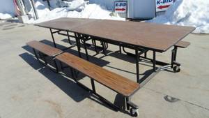 lot 70 image: 117 Folding Roll away Table  Model UF12BEDNPB9-LMB  Size 117
