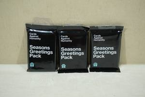 lot 278 image: 3 Packs Cards Against Humanity Seasons Greetings Pack