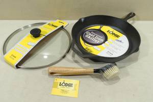 lot 101 image: Lodge Cast Iron 12 Skillet with Lid and Scrub Brush