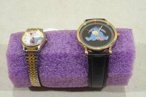 lot 126 image: 2 Disneys Winnie the Pooh Eeyore Watches