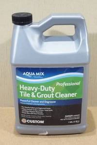 lot 142 image: 1 Gallon Aqua Mix Heavy Duty Tile and Grout Cleaner