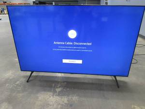 lot 971 image: Samsung 70 Class TU7000 Crystal UHD 4K Smart TV UN70TU7000BXZA (SMALL CUT ON BOTTOM OF SCREEN, SEE PHOTOS)