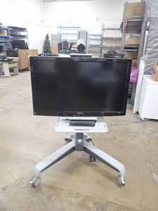 lot 1 image: Mobile TV Setup  Panasonic&nbspTC-L42U22 LCD TV  42 screen with HD resolution  Includes Tandberg confrence camera, microphone and media Centre  Includes LG Blueray player  Includes everything photod 