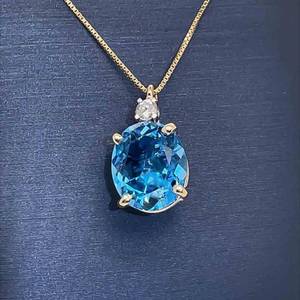 Blue Topaz & Diamond 2-Stone Oval Pendant in 14k Yellow Gold VIDEO