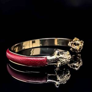 Designer Fashion Vintage Estate Runway Bracelet in Red Leather and a Lion Motif Stamped SCA-TEL FIRENZE