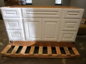 lot 20 image: Glacier Bay Hampton 60 in. W x 21 in. D x 33.5 in. H Bathroom Vanity Cabinet without Top in White (TOE KICK IS BROKEN, DAMAGED ON BOTTOM RIGHT HAND CORNER)