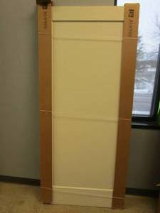 lot 184 image: Jeldwen 36 in. x 80 in. DesignGlide Madison Primed Smooth Molded Composite MDF Interior Barn Door Slab