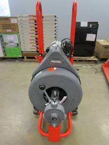 lot 232 image: RIDGID K-750 Drain Cleaning Snake Auger Drum Machine with Autofeed and 34 in. Pigtail (MISSING CUTTERS AND GLOVES)