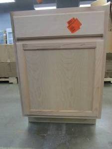 lot 236 image: Hampton Bay Hampton Unfinished Beech Recessed Panel Stock Assembled Base Kitchen Cabinet (24 in. x 34.5 in. x 24 in.) (SIDE IS DAMAGED, SEE PHOTOS)