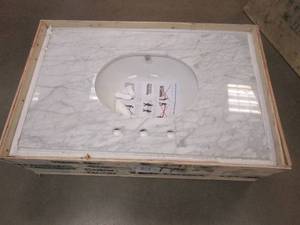 lot 244 image: 36 in x 22 in White Cultured Marble Vanity Top (SMALL SCRATCH ON TOP)