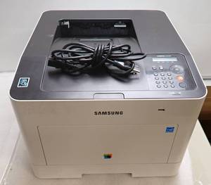 lot 19 image: Samsung C3010DW Wireless Printer  Laser Color  31ppm  Wireless &amp USB  Toner (amount unknown) and Power Cord Included