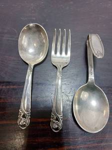 lot 53 image: Three Sterling Silver Utensils