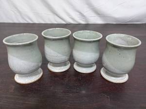 lot 59 image: Set Of Four Pottery Cups