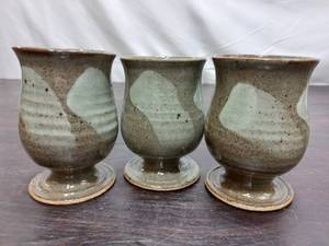 lot 60 image: Set Of Three Pottery Cups
