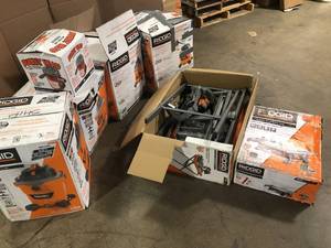lot 18 image: Mix lot of Ridgid Shop Vacuums, Tile Saw, Customer returns, Review all pictures