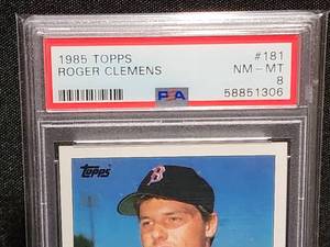 lot 21 image: 1985 Topps Baseball Roger Clemens PSA 8 RC Card #181
