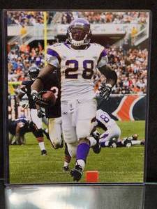 lot 44 image: Former Minnesota Viking RB Adrian Peterson Photo